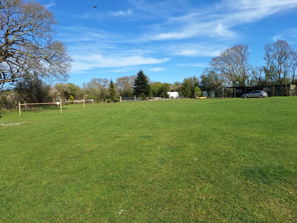 Camping pitches with post-and-rail fencing